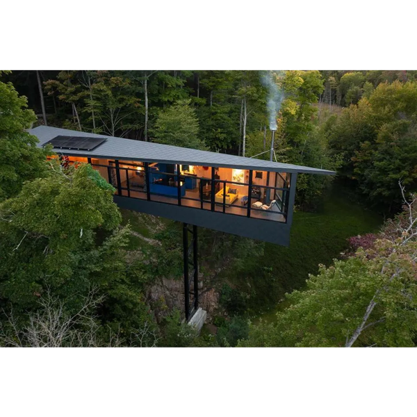 4c4170c4-12fe-4012-b521-726329d8c688-gorgeous-homes-hidden-inside-forests-cantilivered-cabin-above__1_.webp