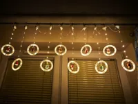 Lampki-LED-kurtyna-z-figurkami-Boze-Narodzenie-3m-125LED-10-zarowek-cieply-bialy-zasilanie-sieciowe__1008363__1200.jpg