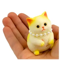 Gniotek-Sensoryczny-Miekki-Kotek-Z-Perlami-Bialo-Zolty-7-5cm__1281101__1200.jpg