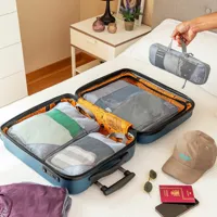 suitcase-organiser-compression-bags-compakube-innovagoods-4-pieces-v0103888-bbv0103888.jpg
