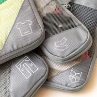 suitcase-organiser-compression-bags-compakube-innovagoods-4-pieces-v0103888-bbv0103888.jpg